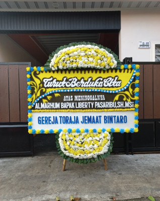 Papan Bunga Duka di Kayu Kubu